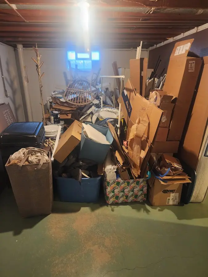 Roll-off dumpster container at job site for 6 Yard Dumpster Rental in West Haven